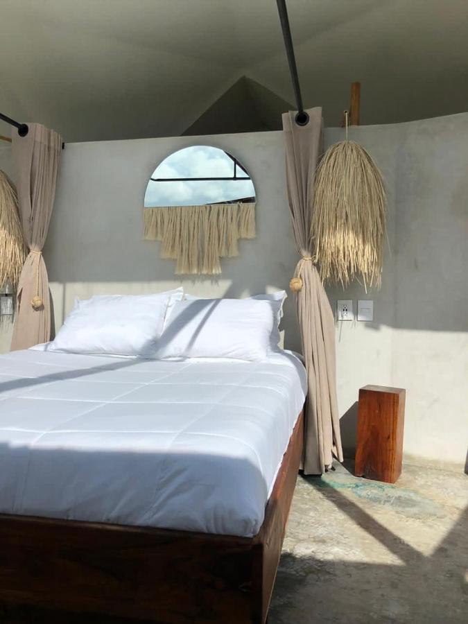 Mamasan Treehouses & Cabins 툴룸 외부 사진