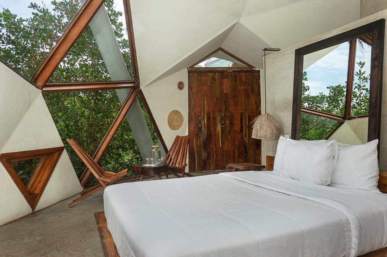 Mamasan Treehouses & Cabins 툴룸 외부 사진