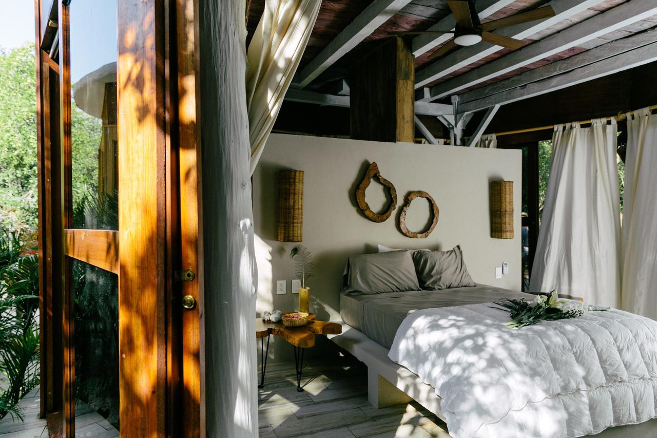 Mamasan Treehouses & Cabins 툴룸 외부 사진